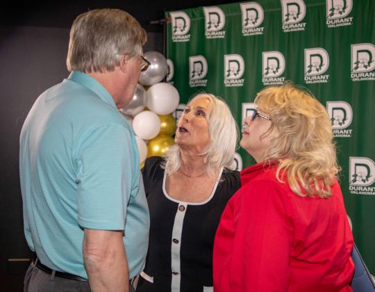 Pam Polk, who began her duties April 5 as Durant city manager, talks to Mike and Charlene Ridgway during a welcome reception April 11 at the Donald W. Reynolds Community Center &amp; Library. Matt Swearengin | Durant Democrat