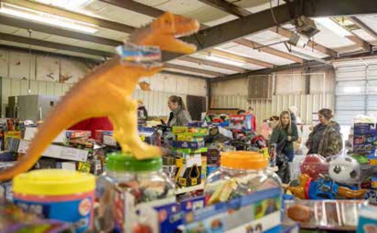 The Durant Lions Club Toys for Tots/Lions Toy Box program was a huge success this year with more than $19,000 worth of toys given out to area children Saturday at the Bryan County Fairgrounds. Matt Swearengin | Durant Democrat