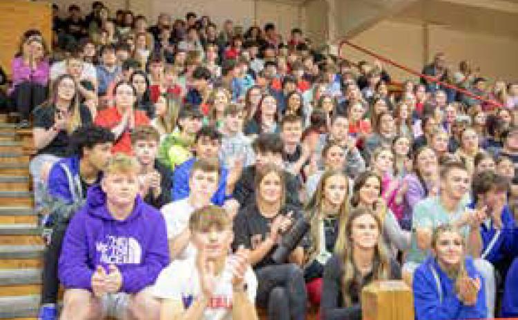 Silo students react during a recent assembly when it was announced that senior Bayleigh Bransford enlised in the Oklahoma National Guard.